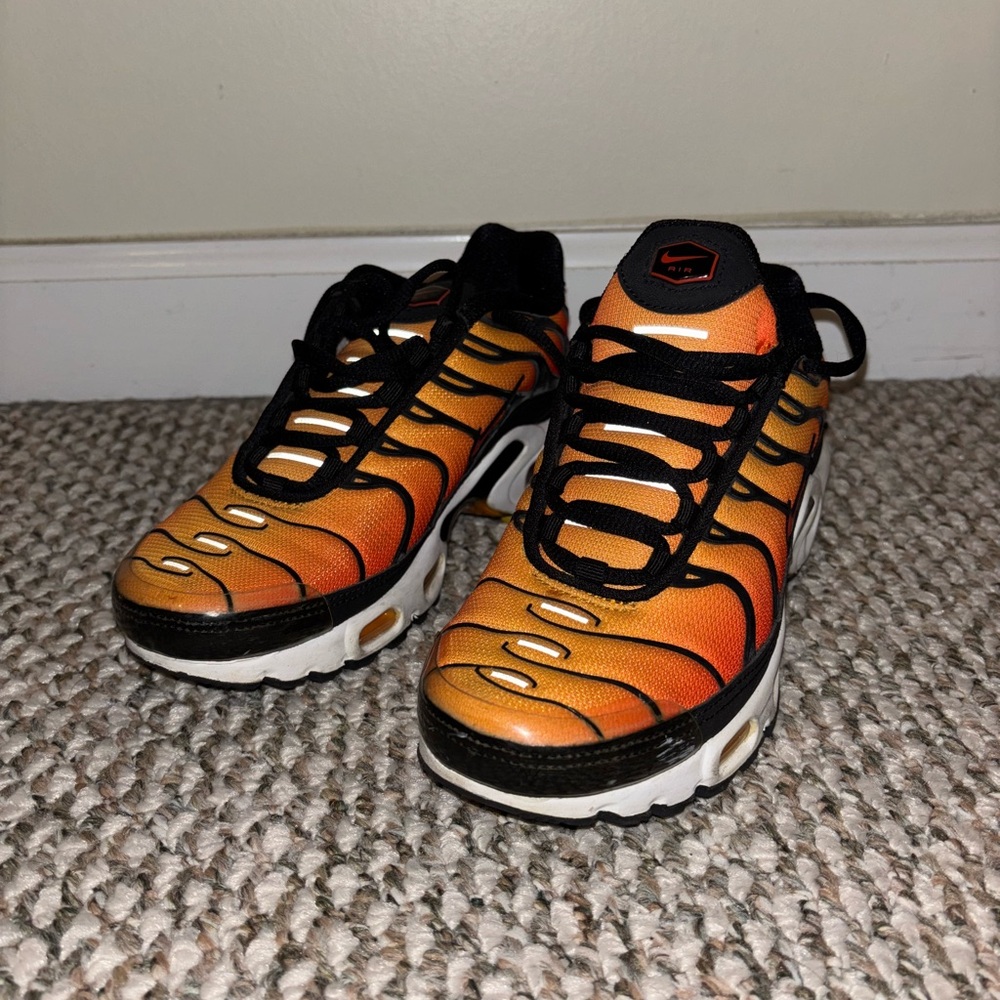Nike Orange and Black Sneakers with Tuned Air Cushioning